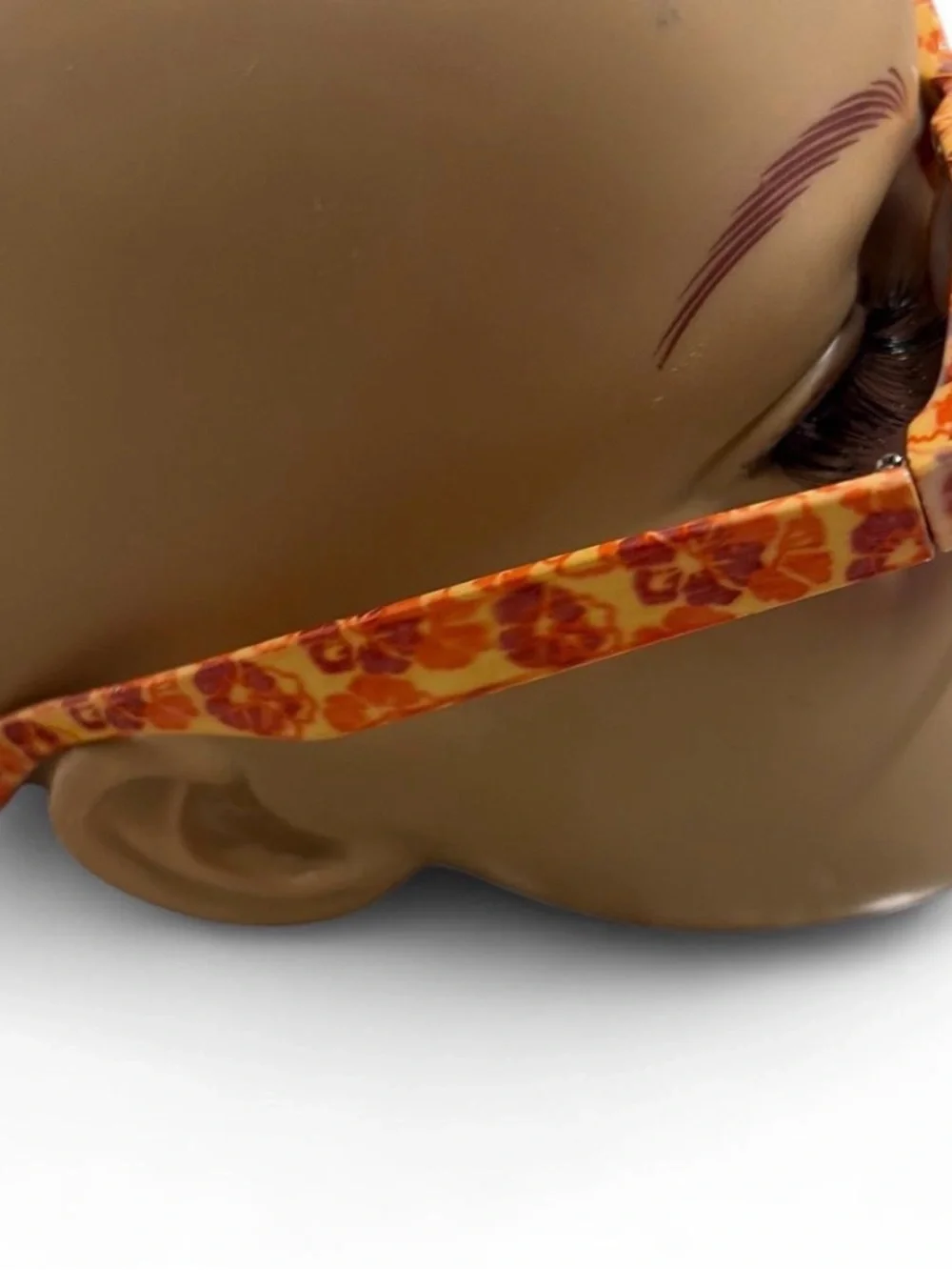 Stylish Orange Floral Wayfarer Sunglasses for women in excellent condition